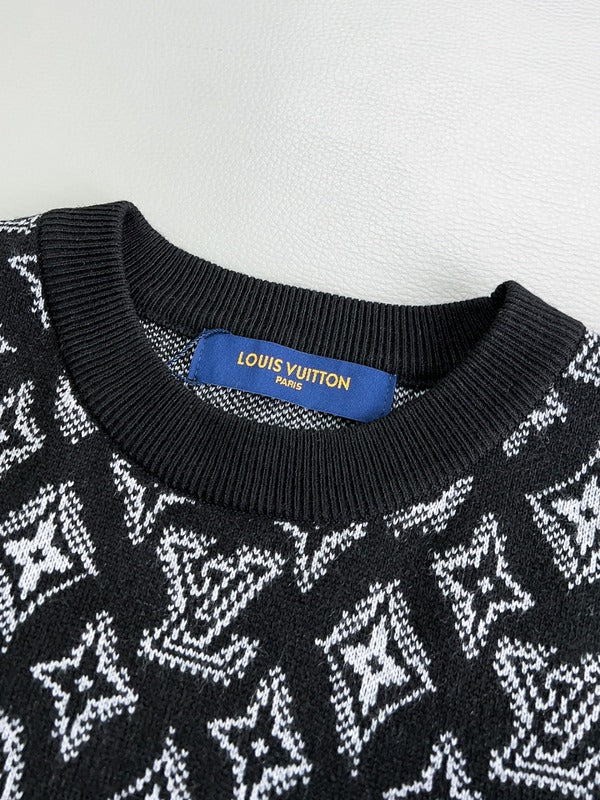 Flat lay presentation of Louis Vuitton luxury clothing with monogram-inspired silhouette