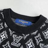 Flat lay presentation of Louis Vuitton luxury clothing with monogram-inspired silhouette
