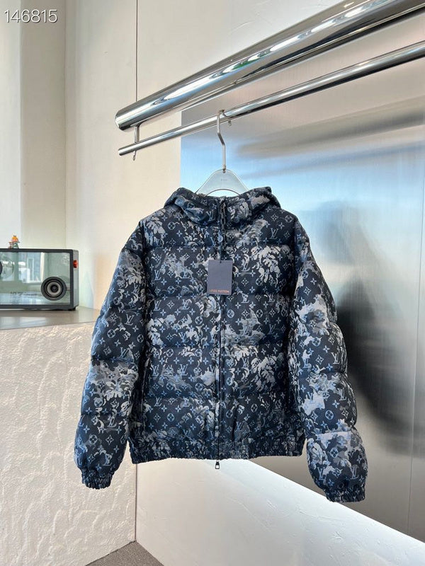 Flat lay presentation of Louis Vuitton luxury clothing with signature branding