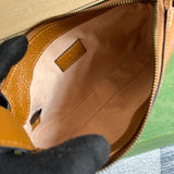 Side profile of chic everyday-luxe women's handbag – women's designer-style accessory