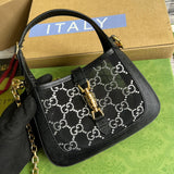 Front view of sleek refined women's handbag – women's luxury handbag
