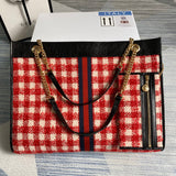 Front view of elevated polished women's handbag – women's designer-style accessory