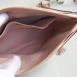 Styled lifestyle shot of elevated classic women's handbag – women's designer-style accessory