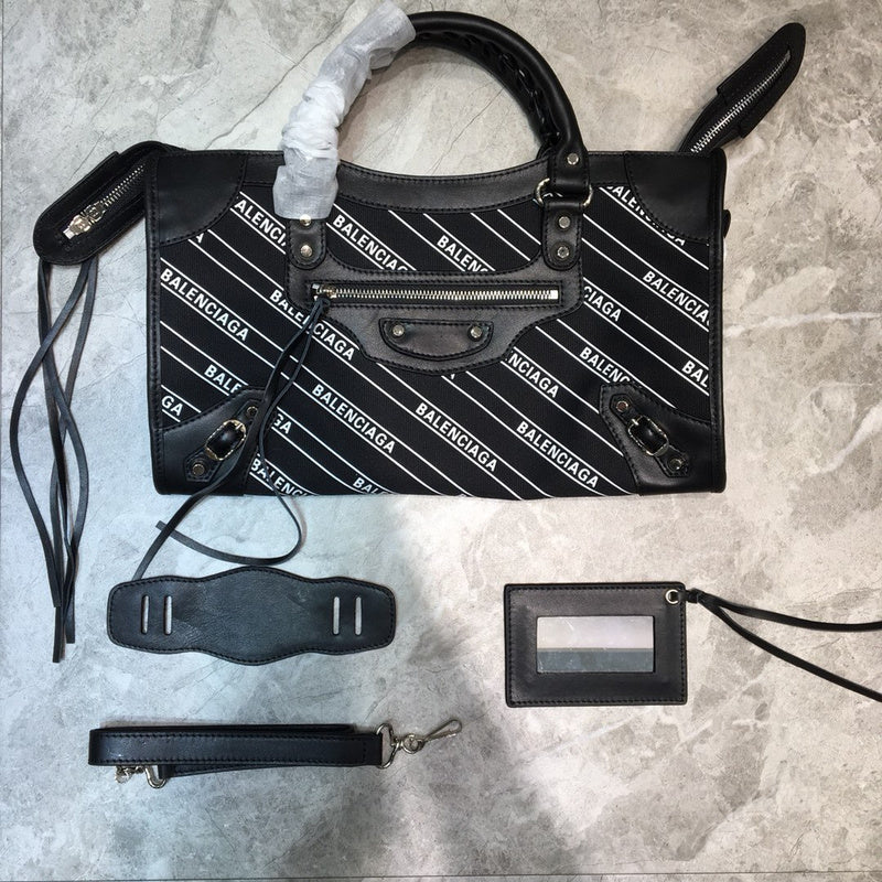 Modern Premium PU Leather Handbag - Statement Silhouette | Women's Premium Handbag #965 - side angle view (image 2) of designer-inspired handbag