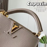 Styled lifestyle shot of classic sleek women's handbag – women's luxury accessory