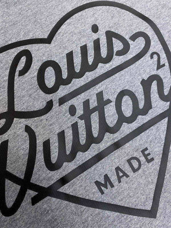 Flat lay presentation of Louis Vuitton cotton t-shirt with signature branding