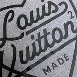 Flat lay presentation of Louis Vuitton cotton t-shirt with signature branding