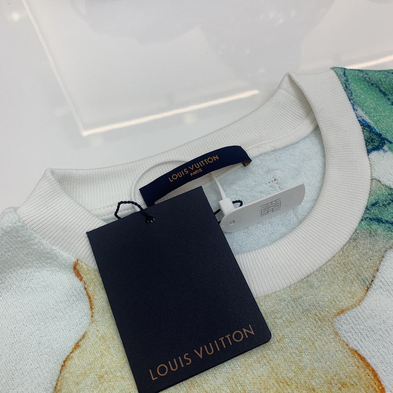 Flat lay presentation of Louis Vuitton luxury clothing with everyday silhouette