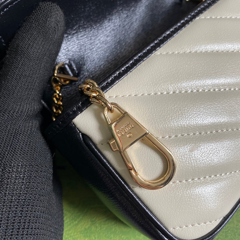 Front view of chic polished women's handbag – women's statement bag