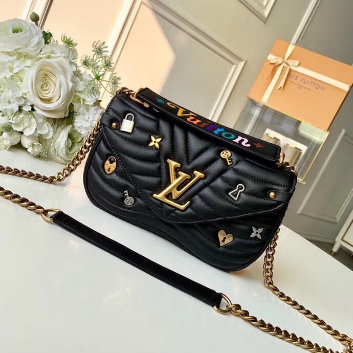 Side profile of signature chic women's handbag – women's luxury accessory
