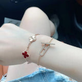Lifestyle view of Van Cleef & Arpels unisex jewelry piece