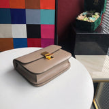 Styled lifestyle shot of modern structured women's handbag – women's luxury handbag