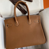 Side view of minimalist structured handbag