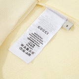 Close-up detail shot of Gucci luxury clothing with contemporary cut