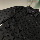 Side profile of Louis Vuitton luxury clothing with signature branding