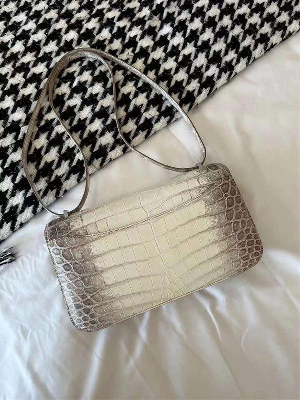 Side view of elegant structured handbag