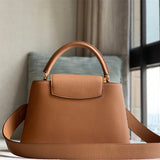  polished crossbody bag detail view showing craftsmanship 32