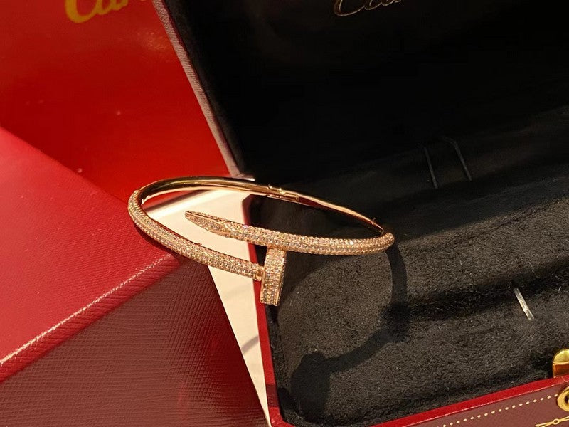 Front view of Cartier unisex jewelry piece