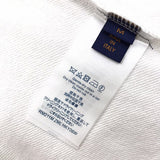 Side profile of Louis Vuitton luxury clothing with label-forward styling