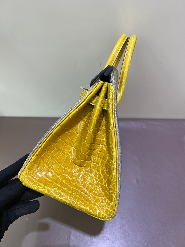Side view of clean-lined structured handbag