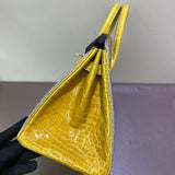 Side view of clean-lined structured handbag