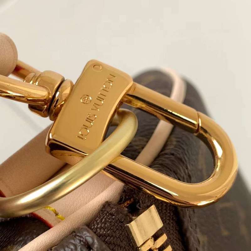 Handle and strap detail of sleek classic women's handbag – women's everyday handbag