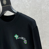Full styled look of Louis Vuitton luxury clothing with logo-detail design