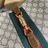Handle and strap detail of everyday-luxe statement women's handbag – women's luxury handbag