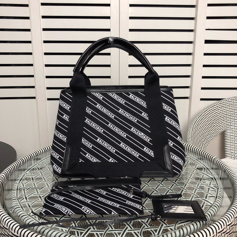 Side profile of polished structured women's handbag – women's statement bag