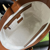 Close-up detail of everyday-luxe structured women's handbag – women's luxury accessory