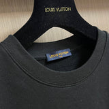 Front view of Louis Vuitton luxury clothing with relaxed-fit cut