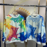 Close-up detail shot of Louis Vuitton luxury clothing with signature branding