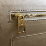 Handle and strap detail of classic polished women's handbag – women's everyday handbag