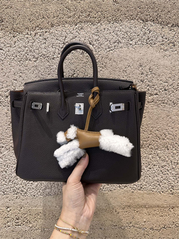 Side view of modern structured handbag
