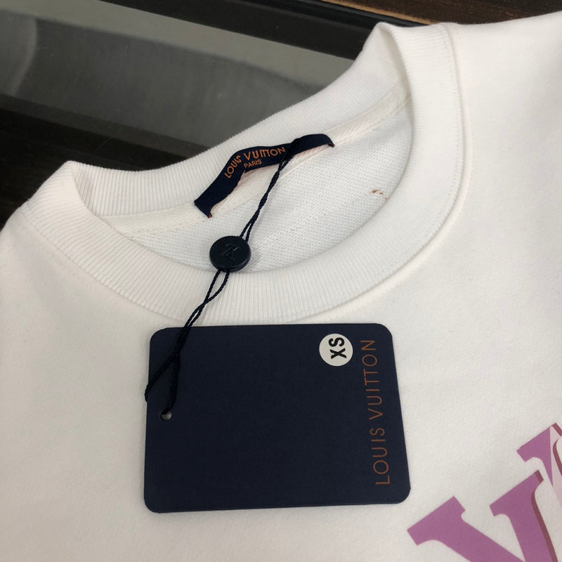 Full styled look of Louis Vuitton luxury clothing with tailored silhouette