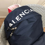 Back view of classic refined women's handbag – women's luxury handbag