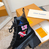 Front view of Louis Vuitton luxury piece style No.168
