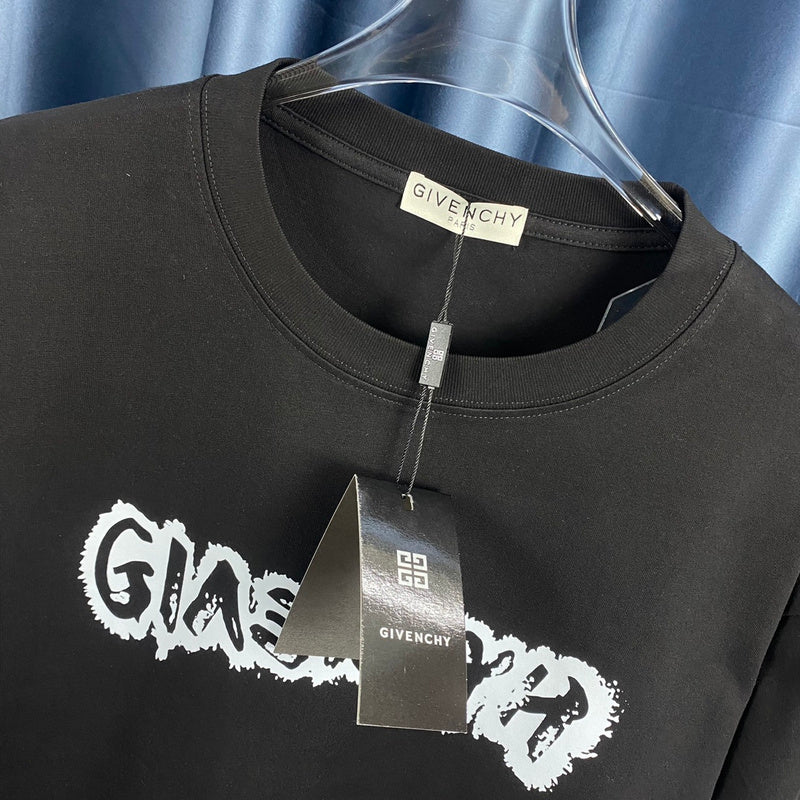 Close-up detail shot of Givenchy luxury clothing with monogram-inspired silhouette