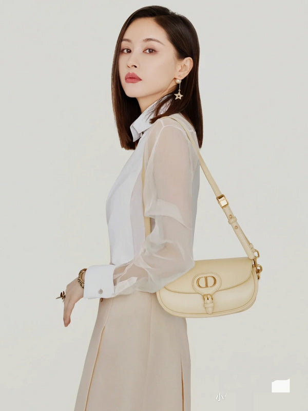 Side profile of refined chic women's handbag – women's designer-style accessory