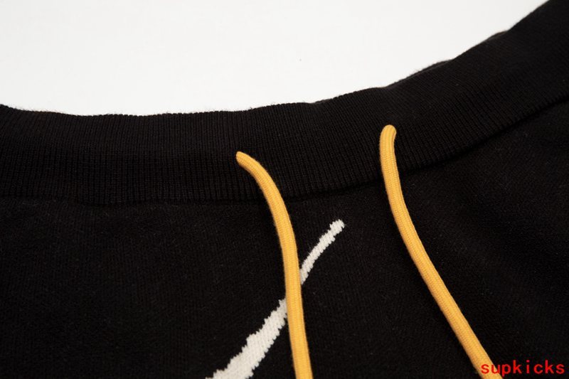 Front view of Rhude luxury clothing with contemporary cut