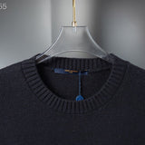 Back view of Louis Vuitton luxury clothing with signature branding
