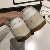 Gucci two-tone luxury sneakers view 8 signature lace-up style