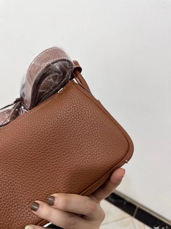 Side view of refined structured handbag
