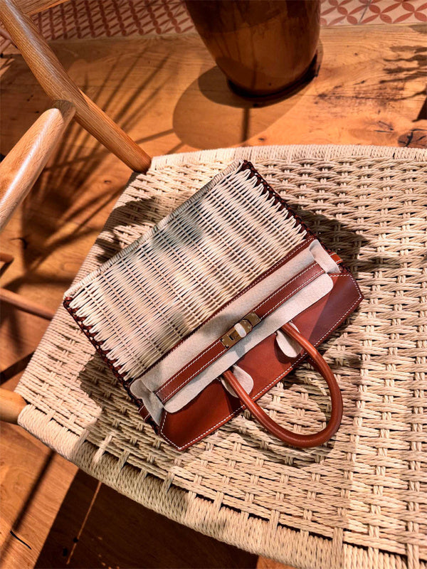 Side view of fluid structured handbag