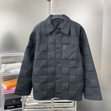 Front view of Louis Vuitton luxury clothing with label-forward styling