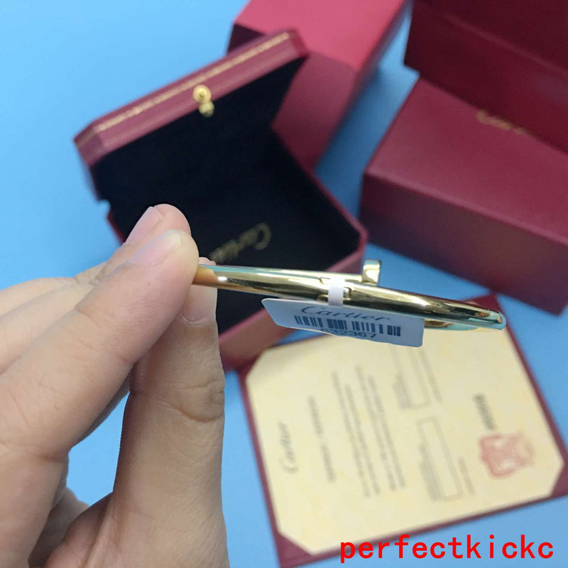 Angled view of Cartier unisex jewelry piece