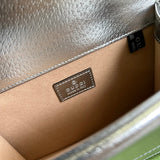 Side profile of statement sleek women's handbag – women's designer-style accessory