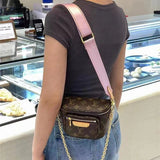  Tailored crossbody bag carried on shoulder
