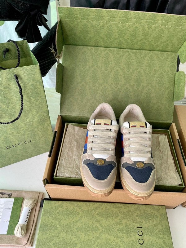 Side profile of Gucci soft grey sneakers classic court silhouette
