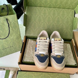 Side profile of Gucci soft grey sneakers classic court silhouette